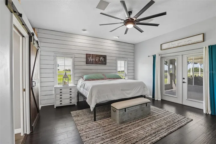 Primary Bedroom With Barn door to Primary Bathroom