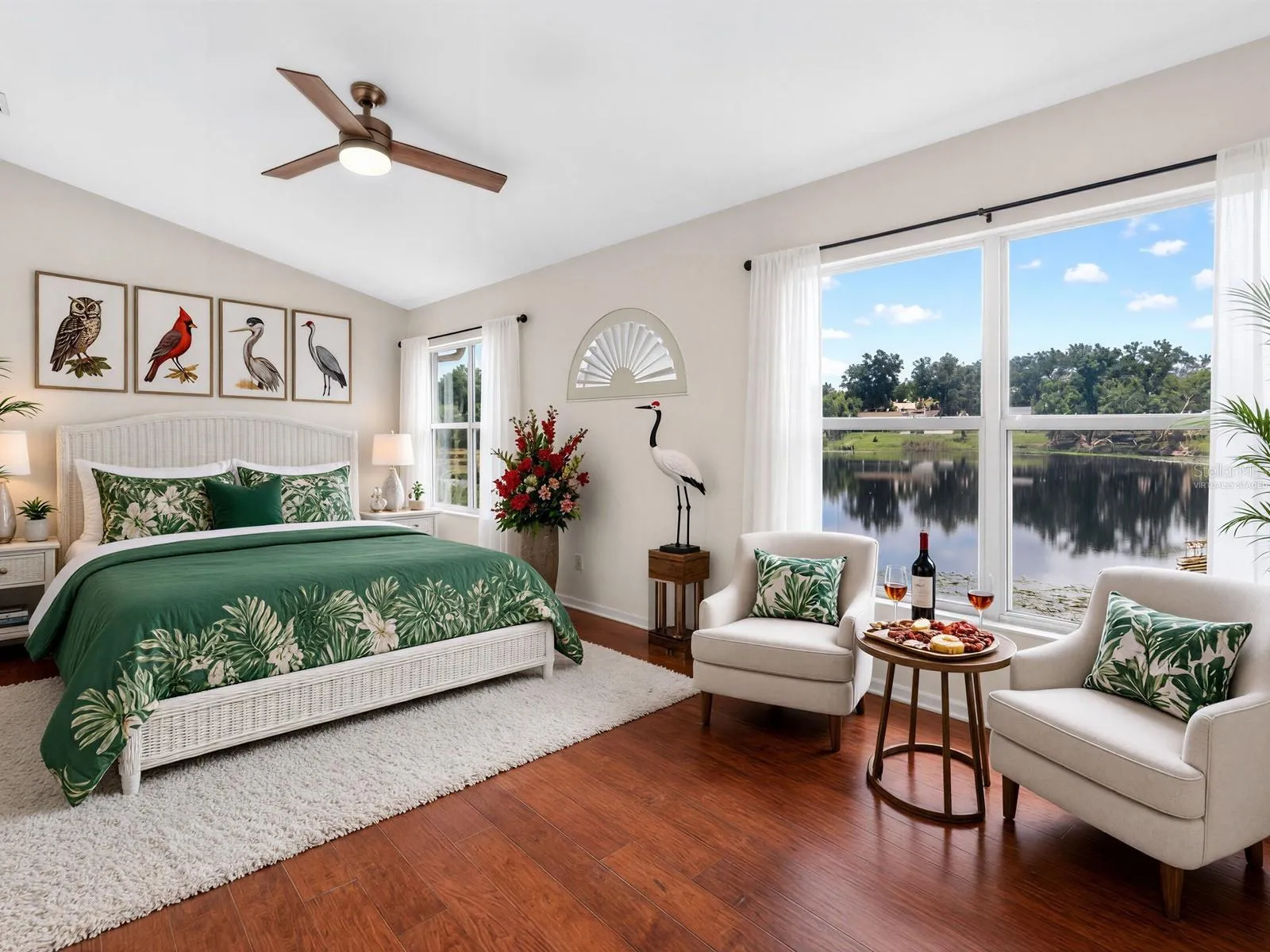Virtually staged master bedroom overlooking the lake