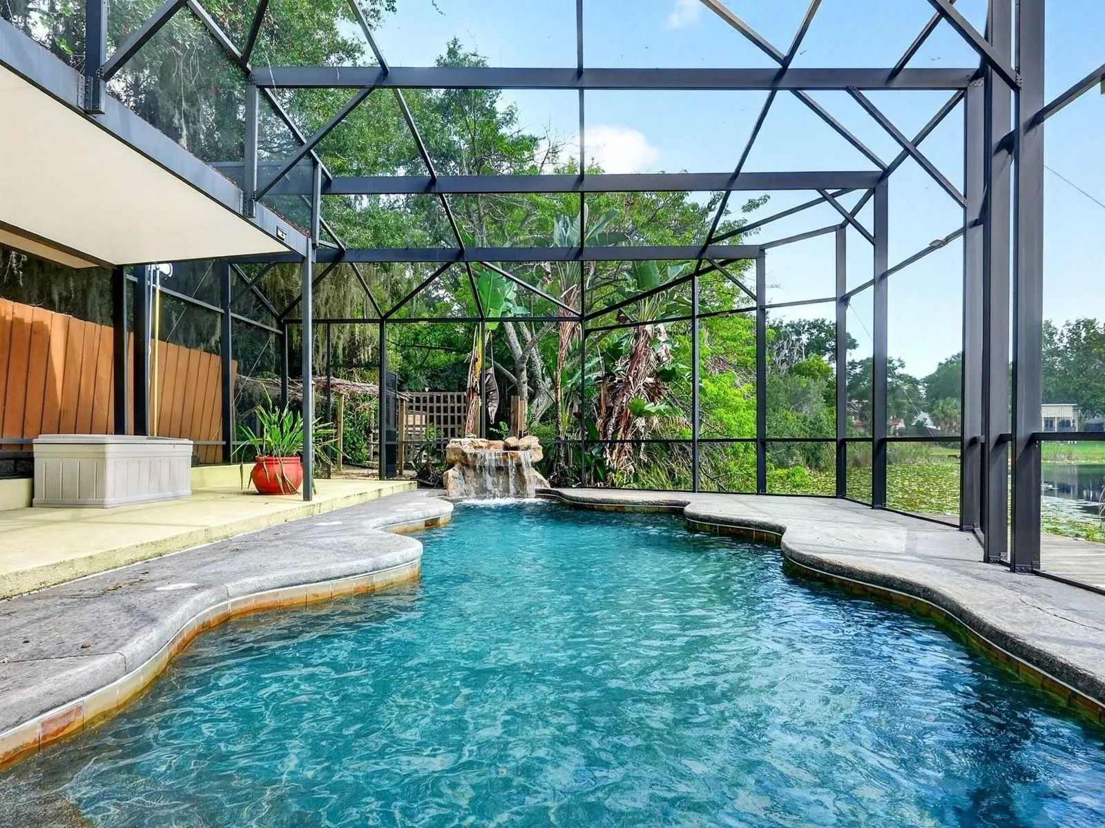 Inground pool overlooks the lake