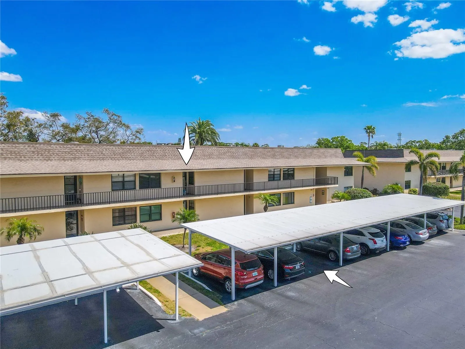 A second-floor setting in Building 3 places the condo above the covered parking area, with assigned covered parking and guest spaces conveniently located just steps from the building.