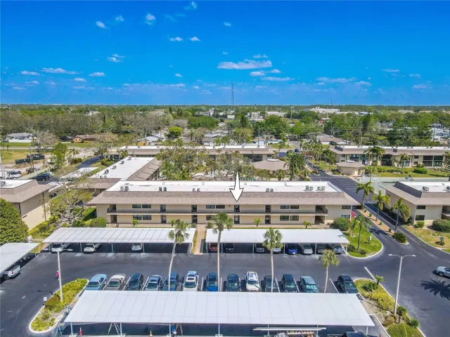Unit 3204 is located on the second floor of Building 3, with covered parking directly in front of the building and additional parking close by.
