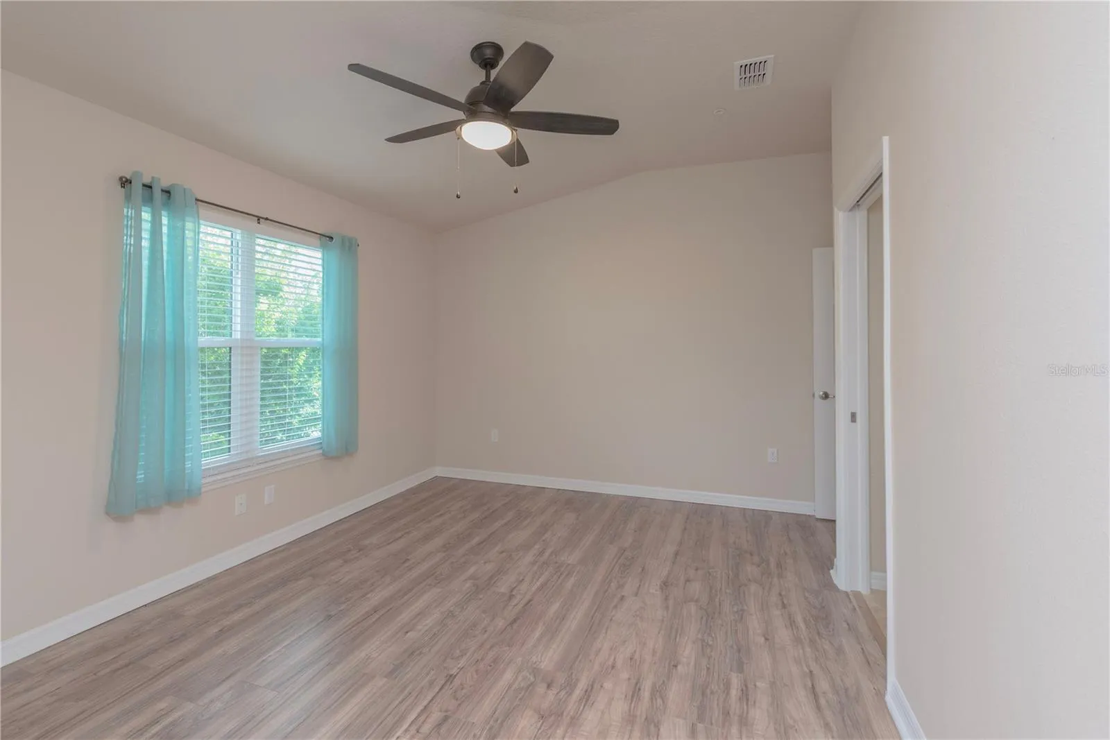 Primary bedroom has walk-in closet.