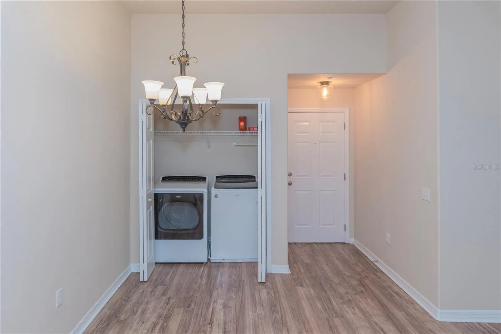 Laundry closet and dining room.
