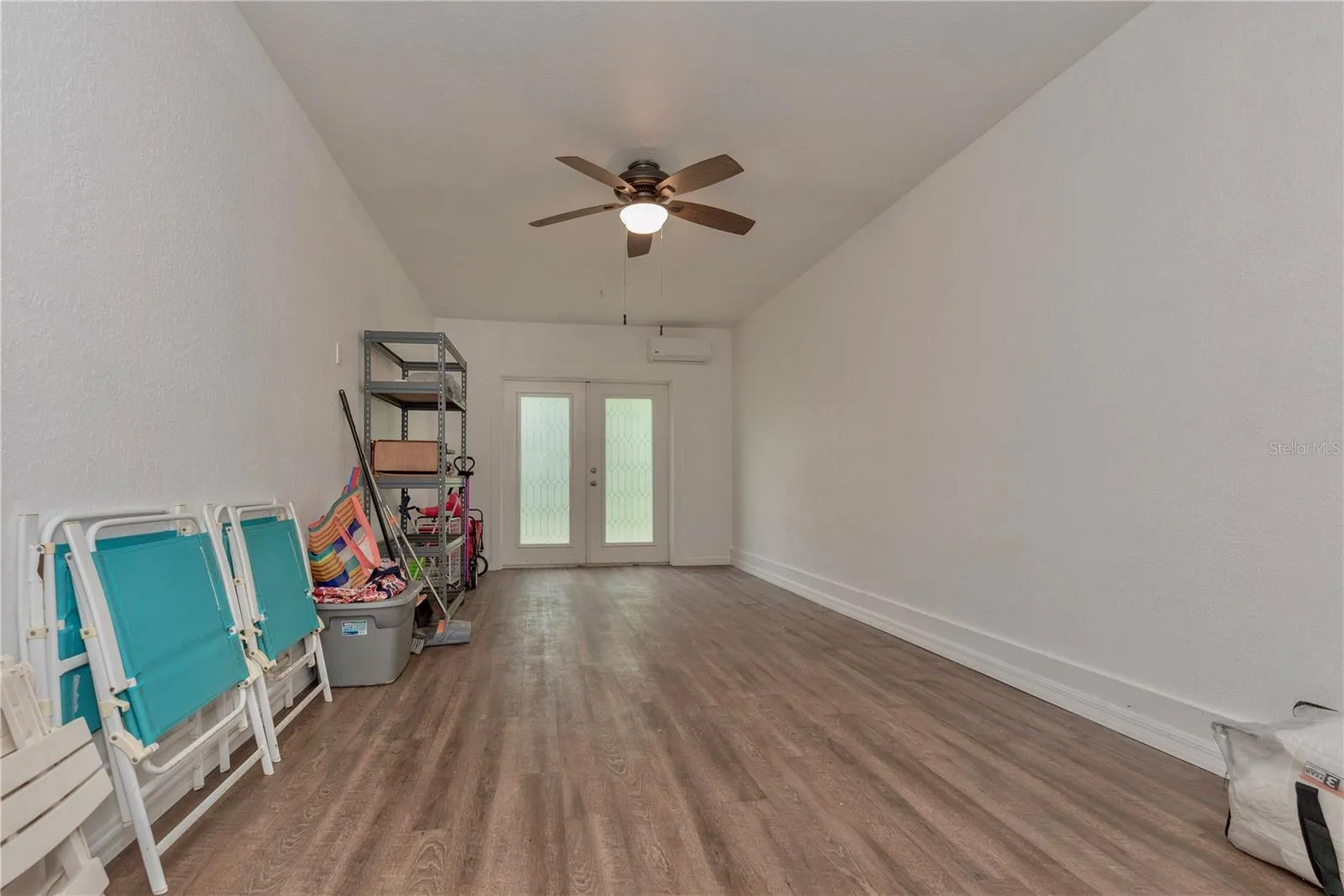 Downstairs storage room is air conditioned with a mini split.