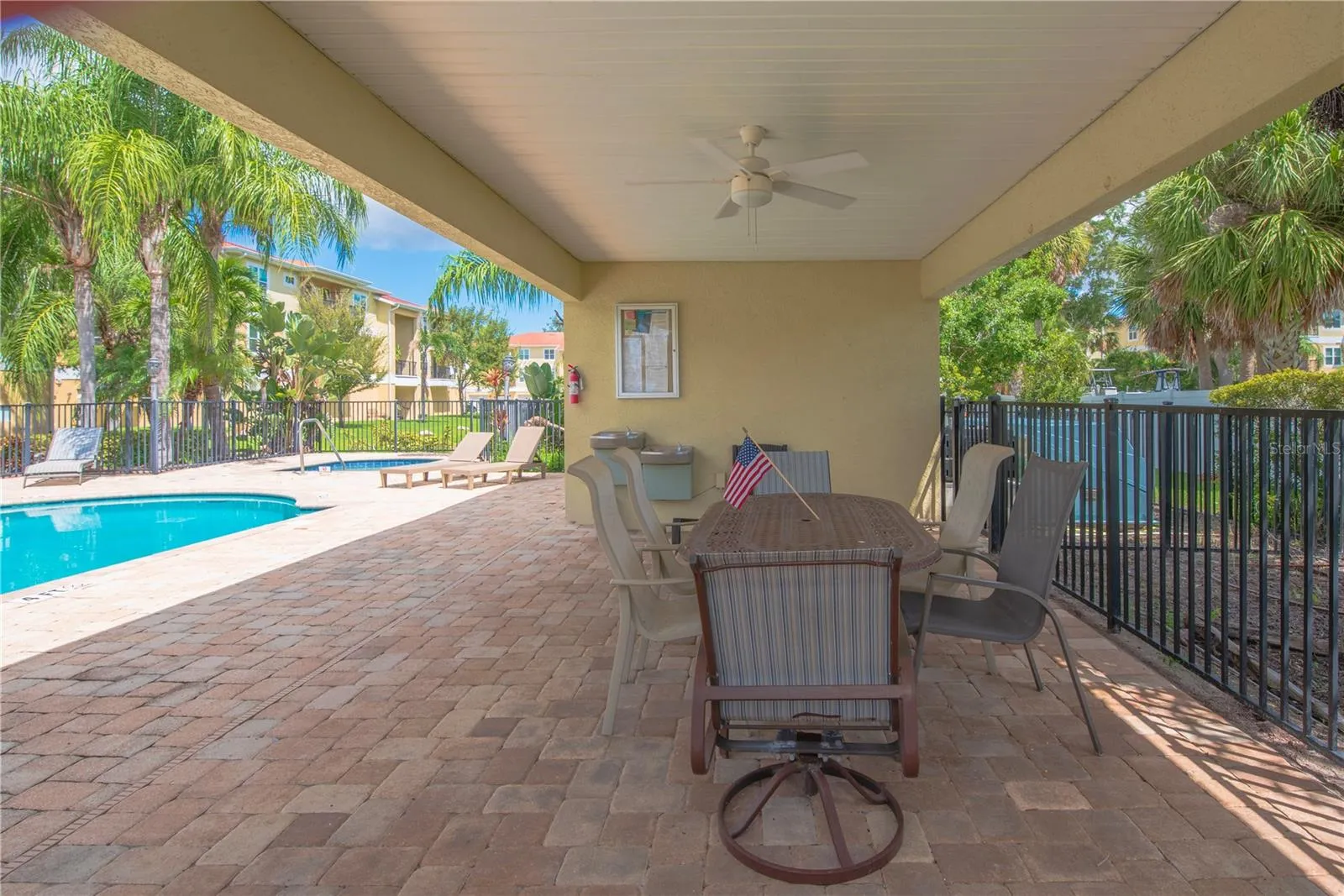 Covered area by the pool.