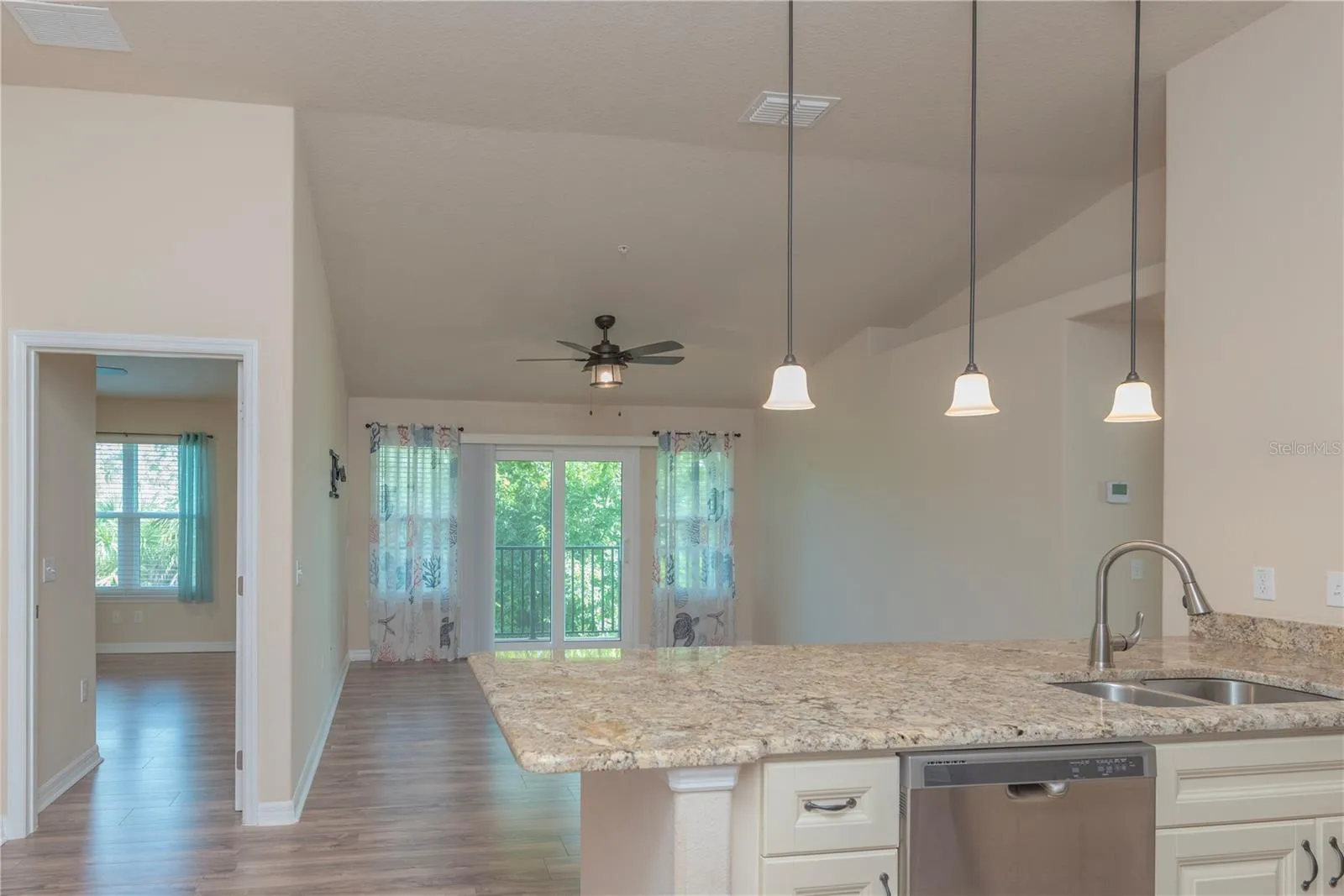 Kitchen and living room.