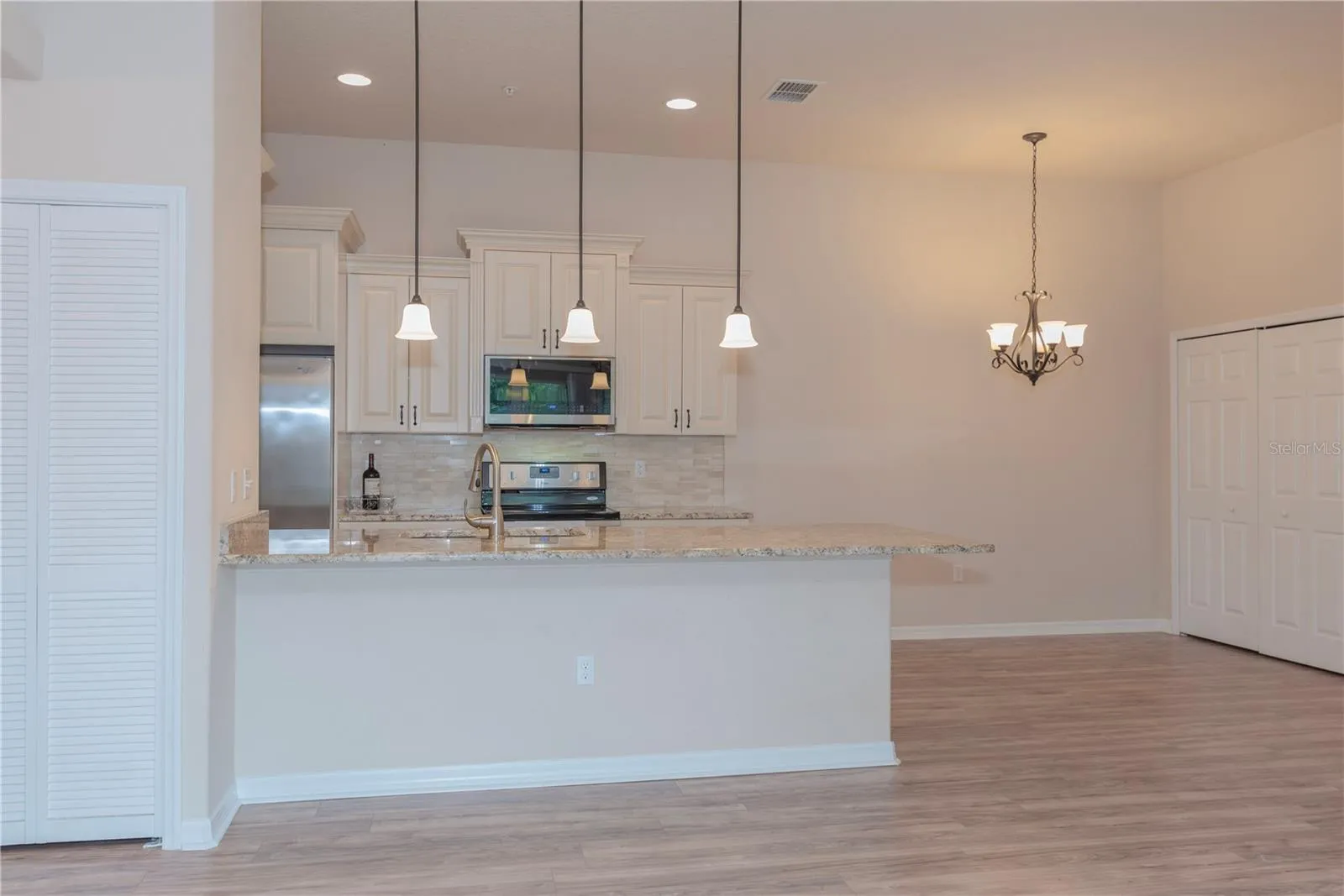 Breakfast bar between the kitchen and living room.