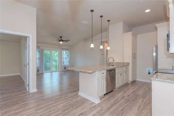 Open floor plan with cathedral ceilings.