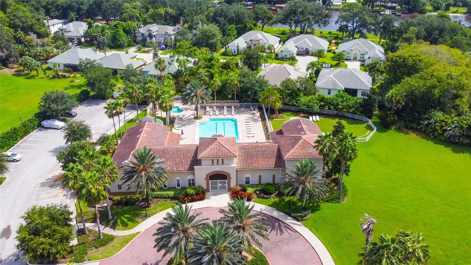 THE CLUBHOUSE COMPLEX WITH HEATED POOL AND LOTS OF PARKING