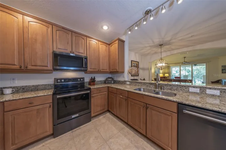 GRANITE BREAKFAST BAR WITH DOUBLE SINK AND A VIEW!