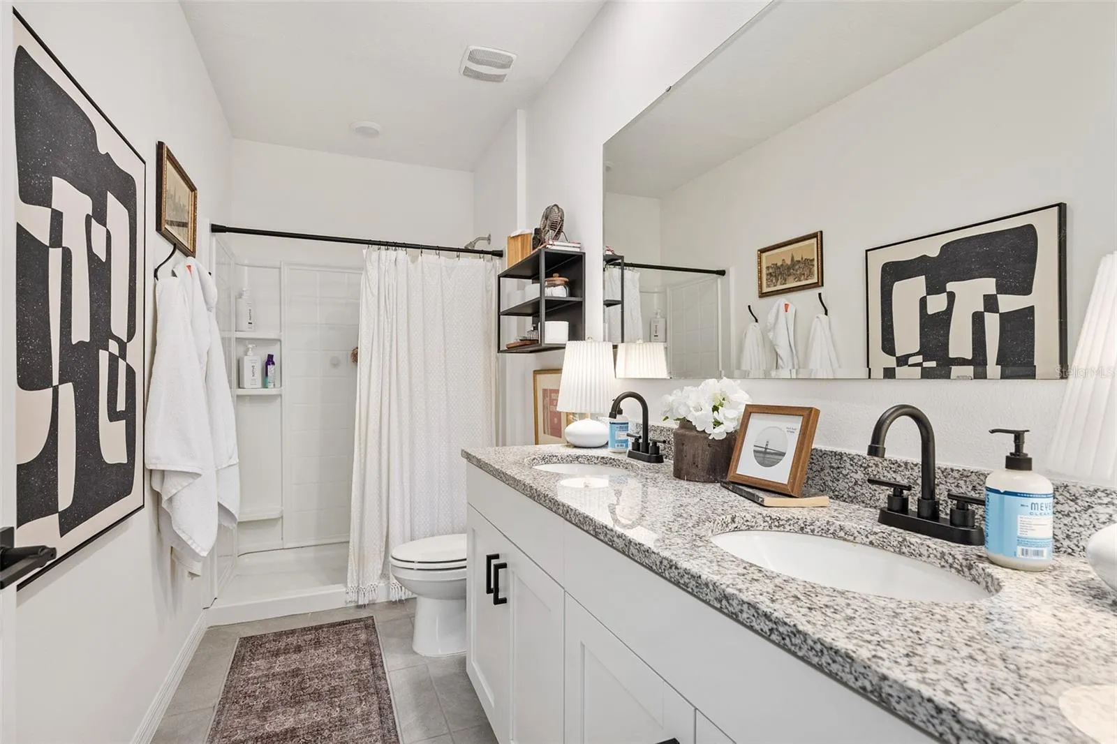 En suite bath, shower no tub