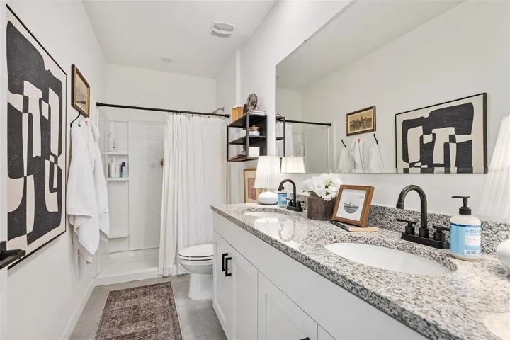 En suite bath, shower no tub