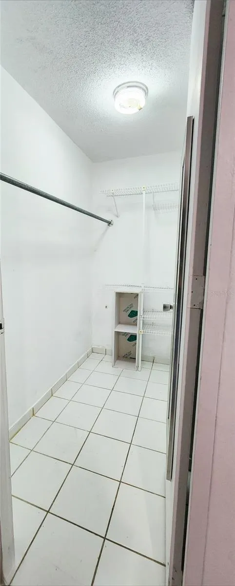 Walk In Closet in Primary Bedroom
