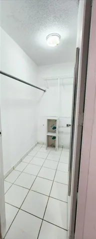 Walk In Closet in Primary Bedroom