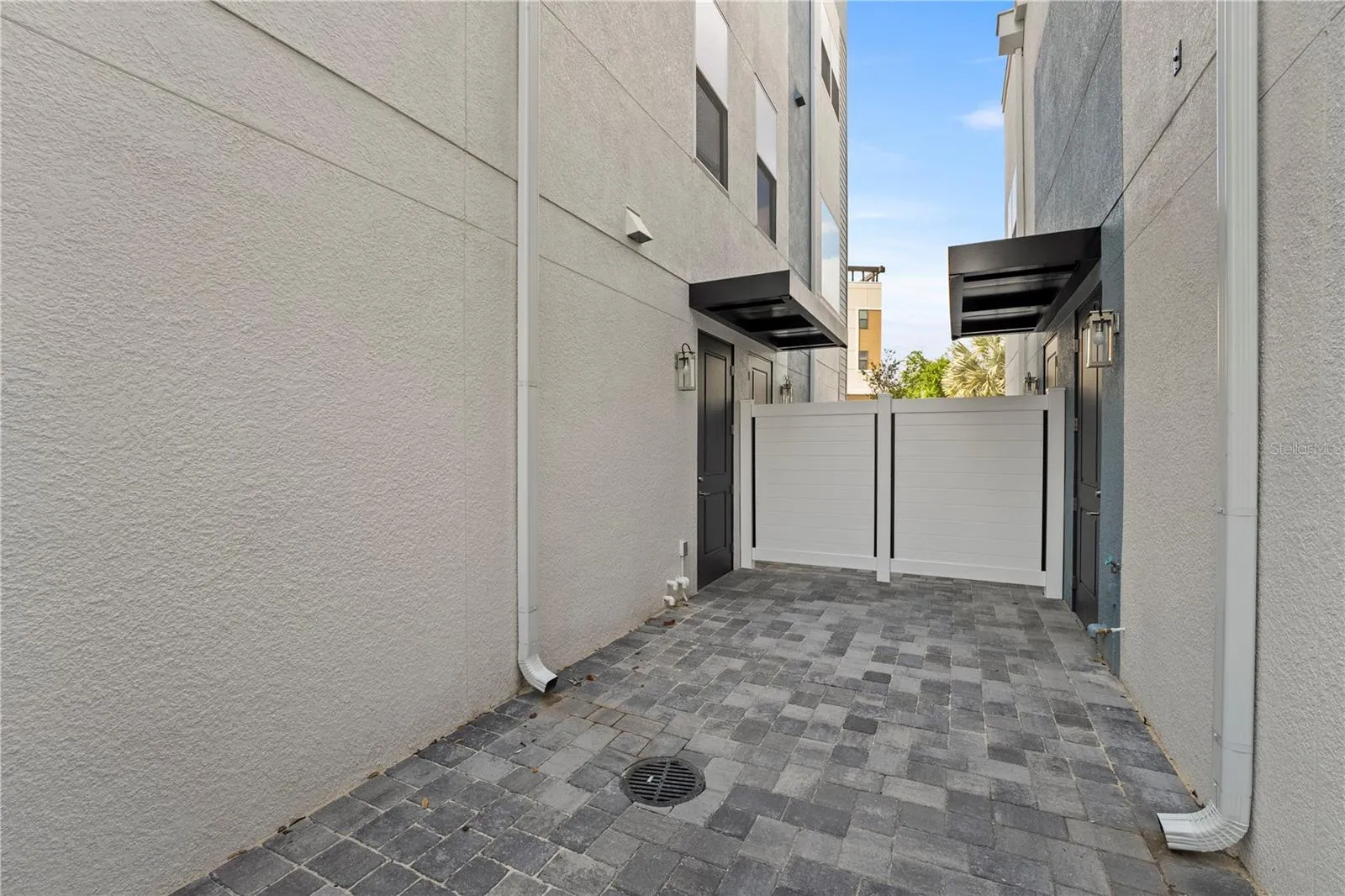 Courtyard, Left door to TH & Right to the Garage