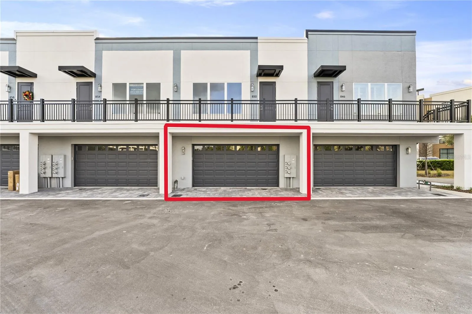 Back Entrance- 2-car Garage for the townhouse with EV charger