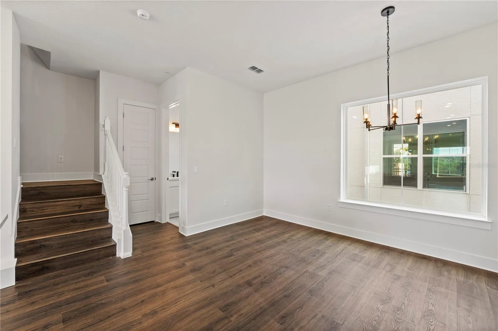 Dining Room, Half Bath and Stairs to 3rd floor bedrooms