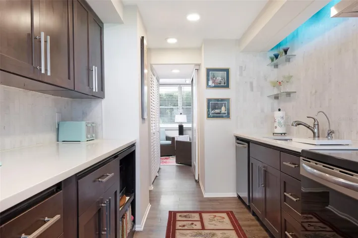Pristine kitchen with multi-color track lighting