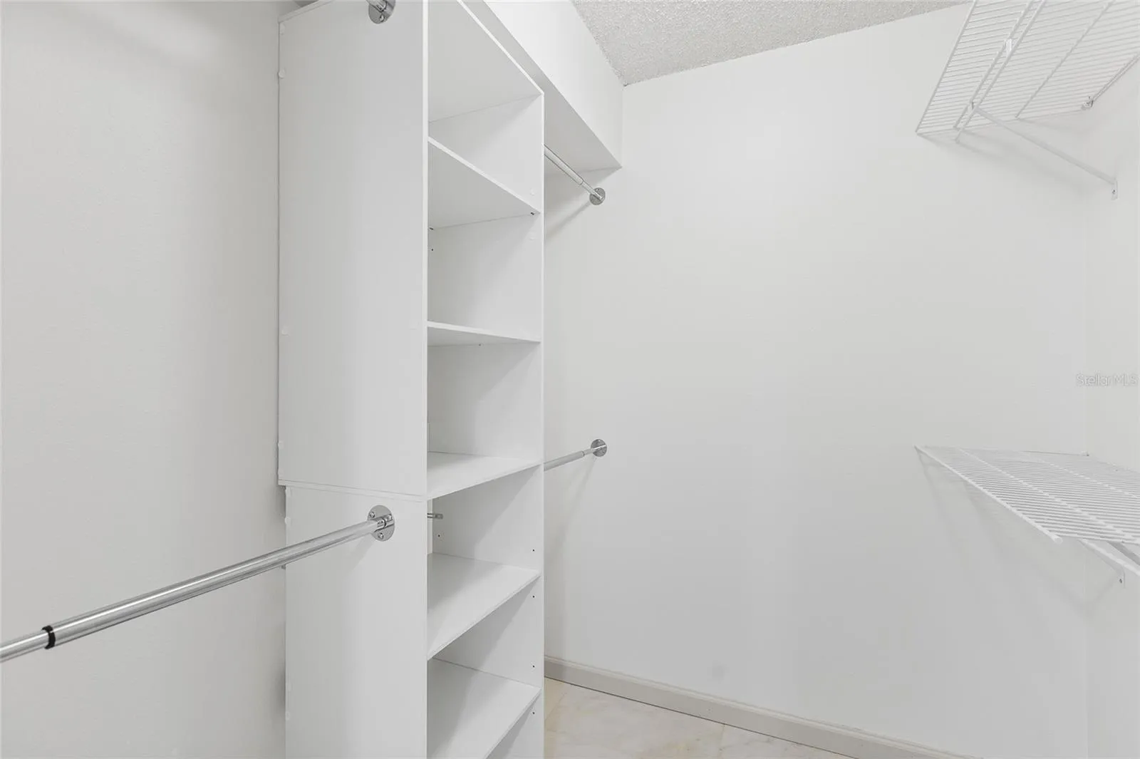 Primary Suite Walk-In Closet