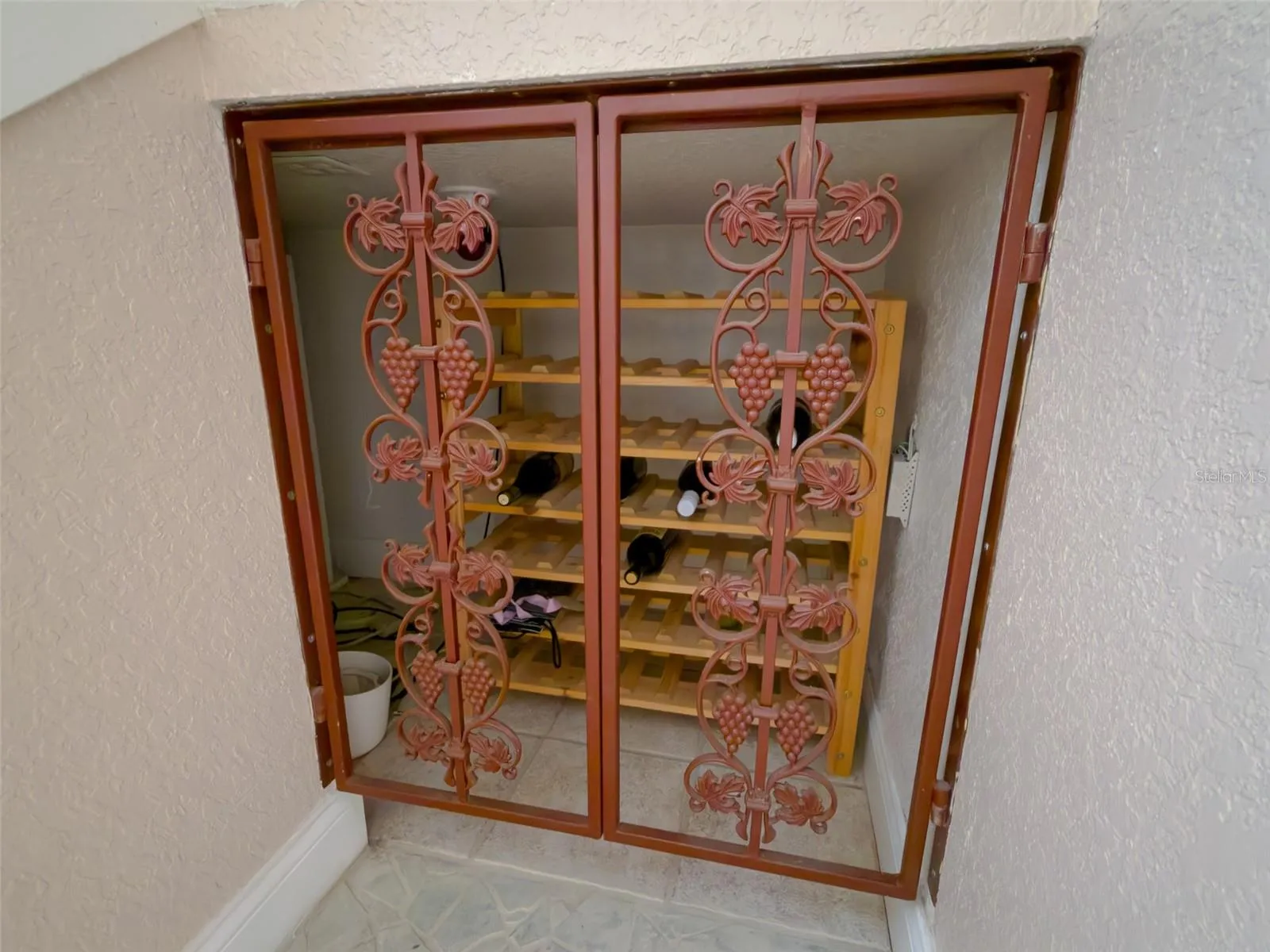Wine cellar under stairwell