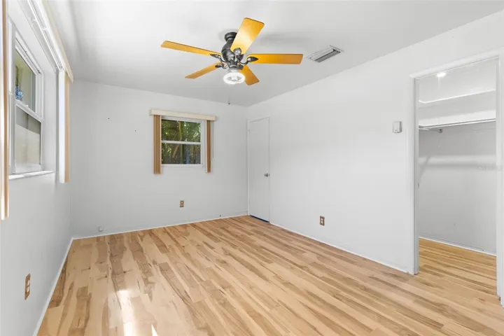 Primary bedroom with walk in closet