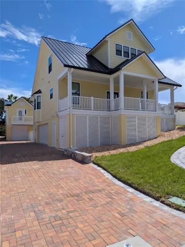 Main house with apartment house & additional 2 car garage in back