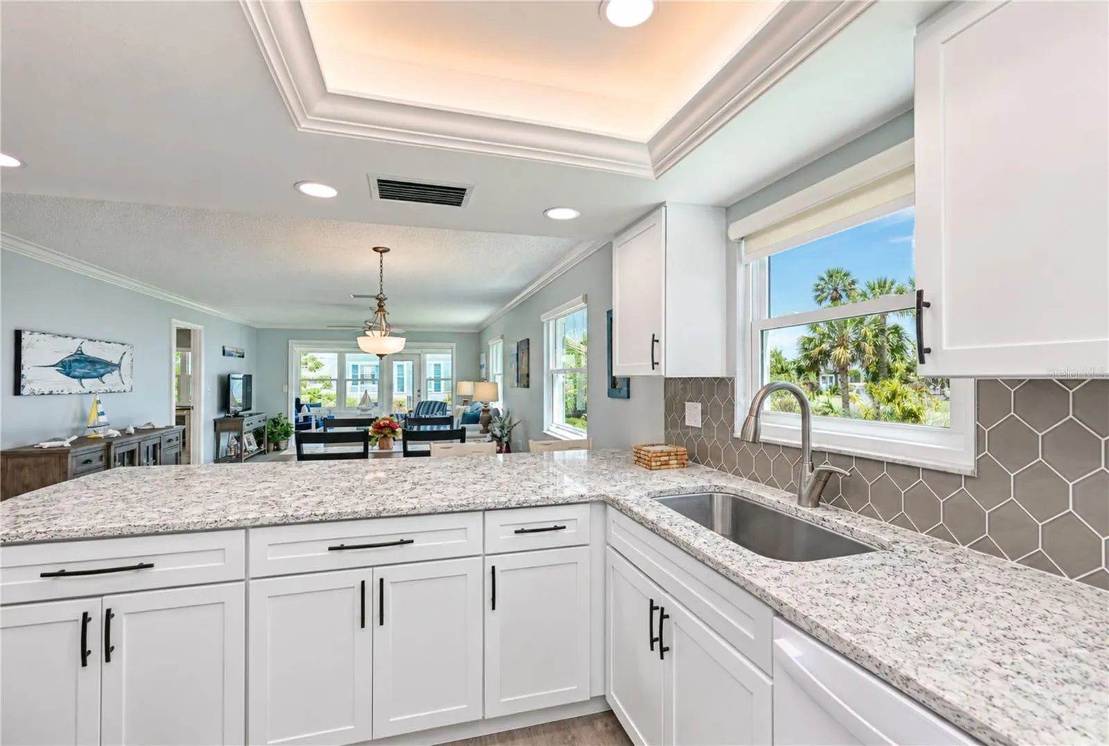View of kitchen through villa to back