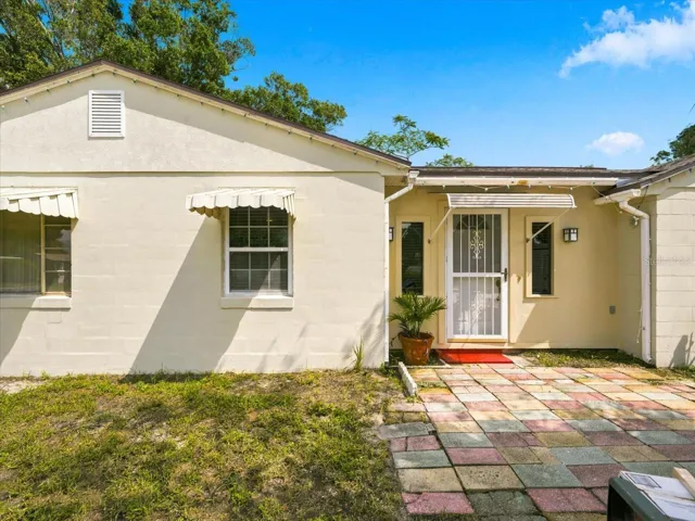 Side door view with patio