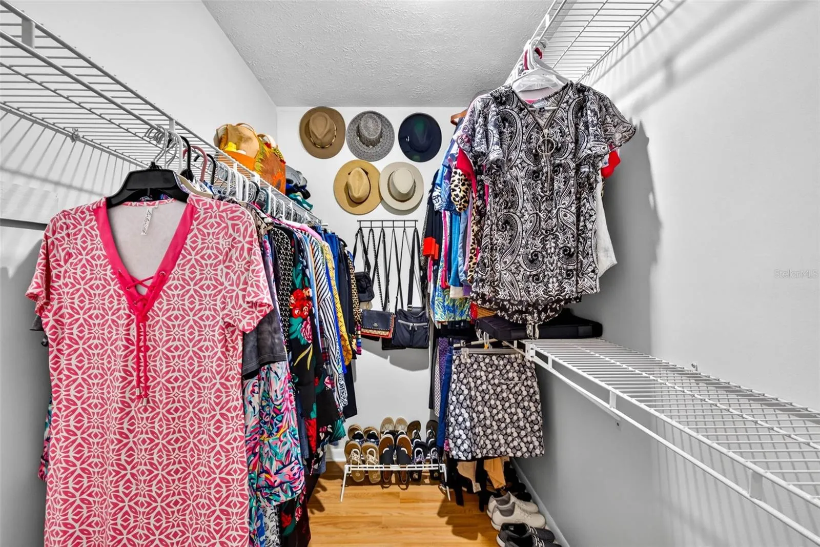 Primary Bedroom walk in closet