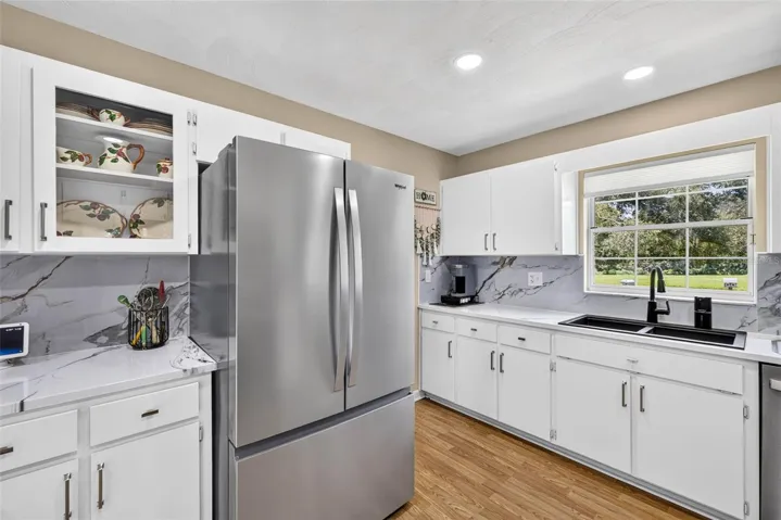 Large open kitchen with loads of cabinets