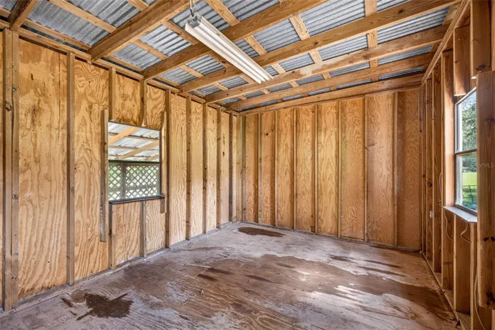 Detached storage shed with lean to storage