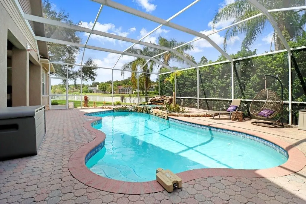 Screened with privacy landscaping pool & spa