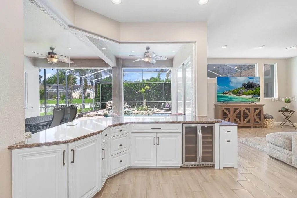 Custom wet bar with wine refrigerator