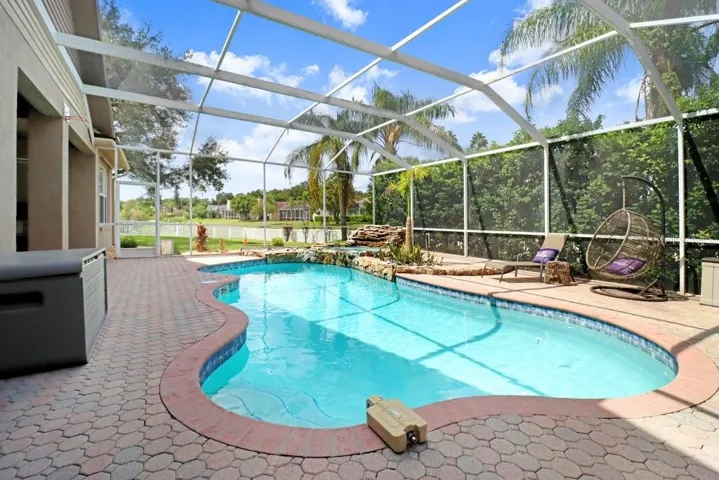 Screened with privacy landscaping pool & spa