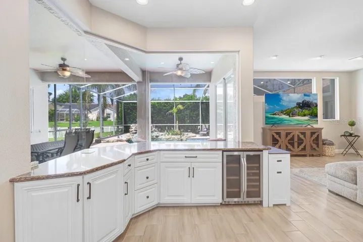Custom wet bar with wine refrigerator