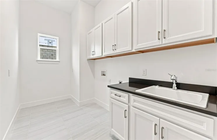 Laundry Room w/Built-in Cabinets