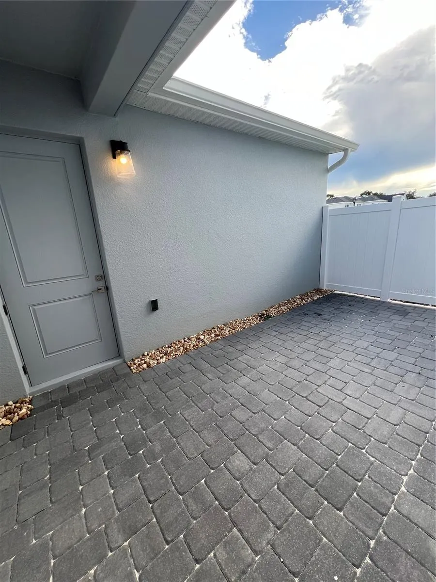 Courtyard, 2 car garage and 2 car driveway