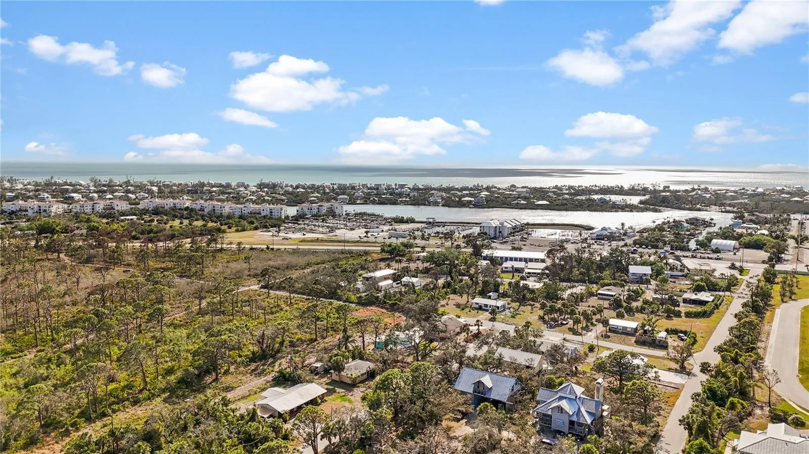 This is an aerial shot to give you and idea of where this home is situated in relation to the Gulf and marinas.