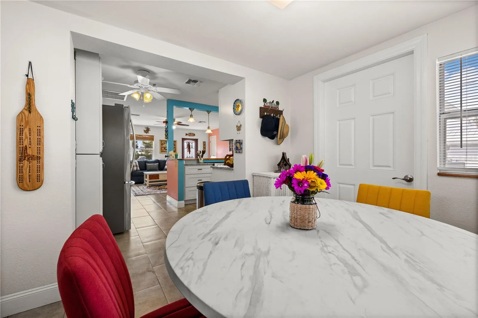 A view into the kitchen from the dining area.