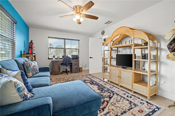 Another view of the third bedroom used as a family room.