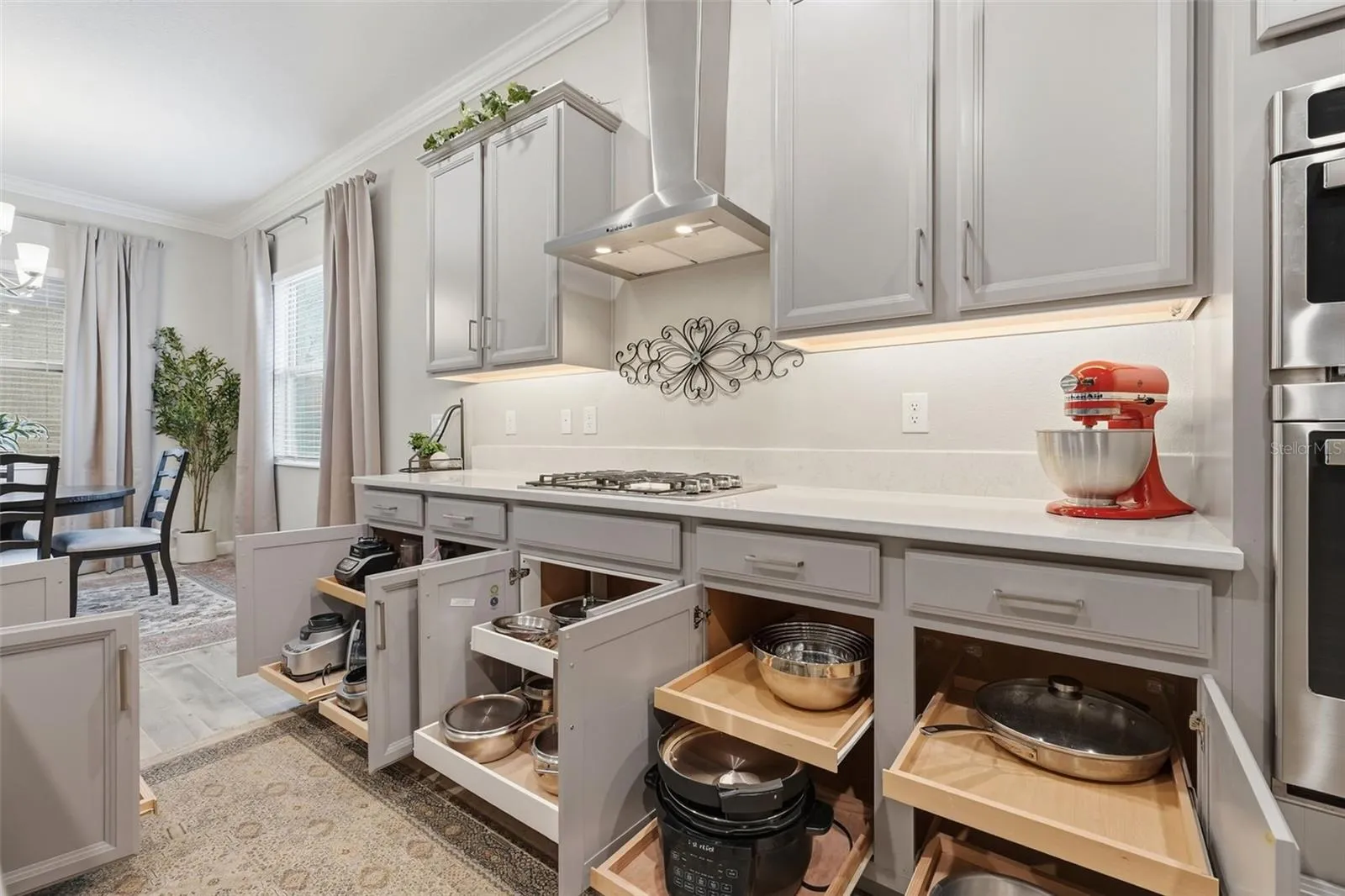 Cabinetry with pull out drawers in kitchen and bathrooms