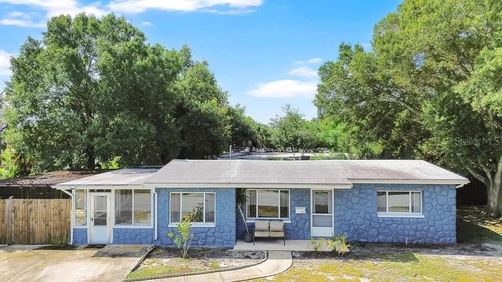 Sturdy block construction, no flood zone, 2018 roof, newer water heater, serviced AC, this home is move in ready!