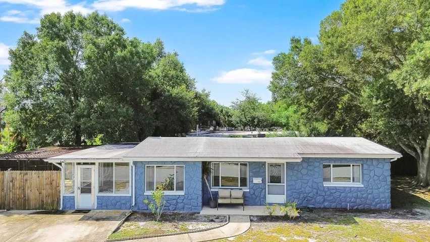 Sturdy block construction, no flood zone, 2018 roof, newer water heater, serviced AC, this home is move in ready!