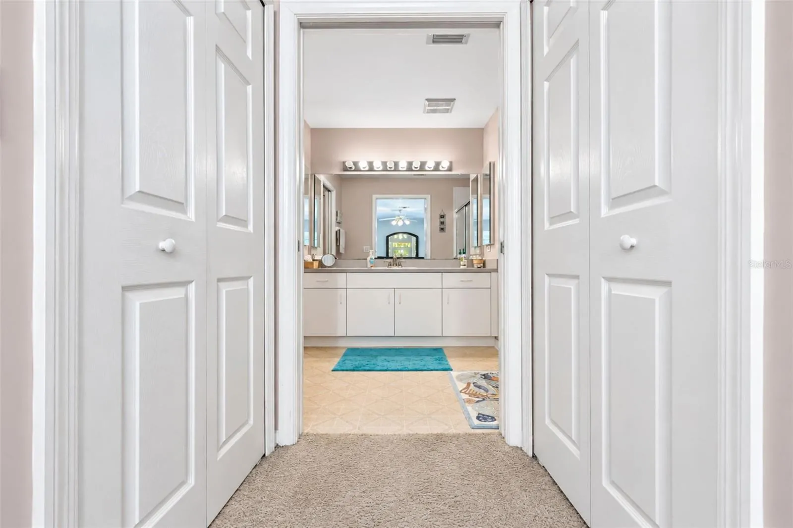 There are 2 spacious walk-in closets between the primary suite & bathroom.