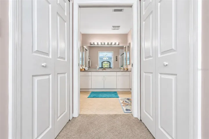 There are 2 spacious walk-in closets between the primary suite & bathroom.