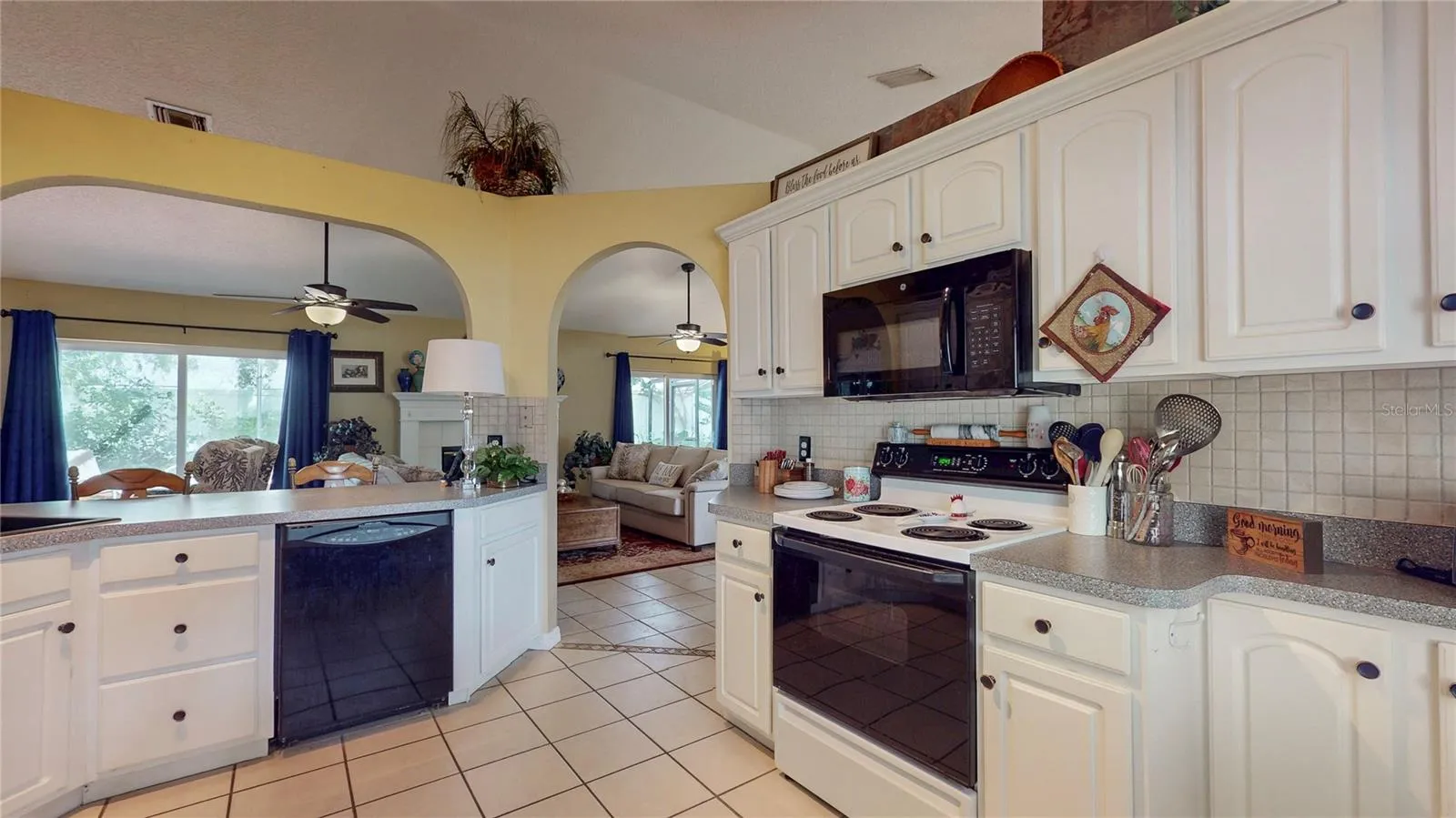 Kitchen opens to Living Room
