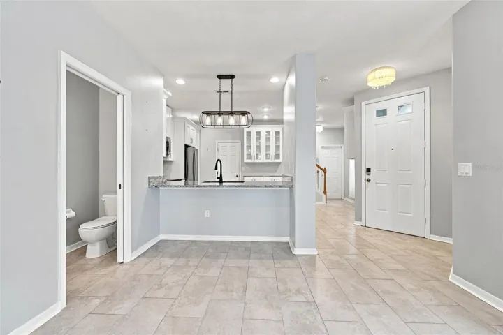 Kitchen, Dining, Entry, & Half Bathroom