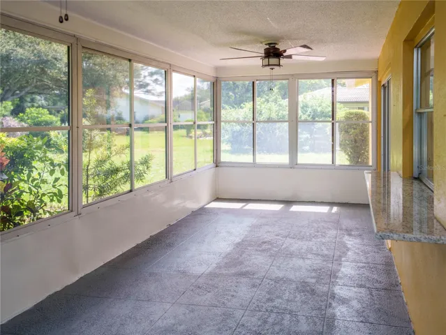 Screened back porch with vinyl windows