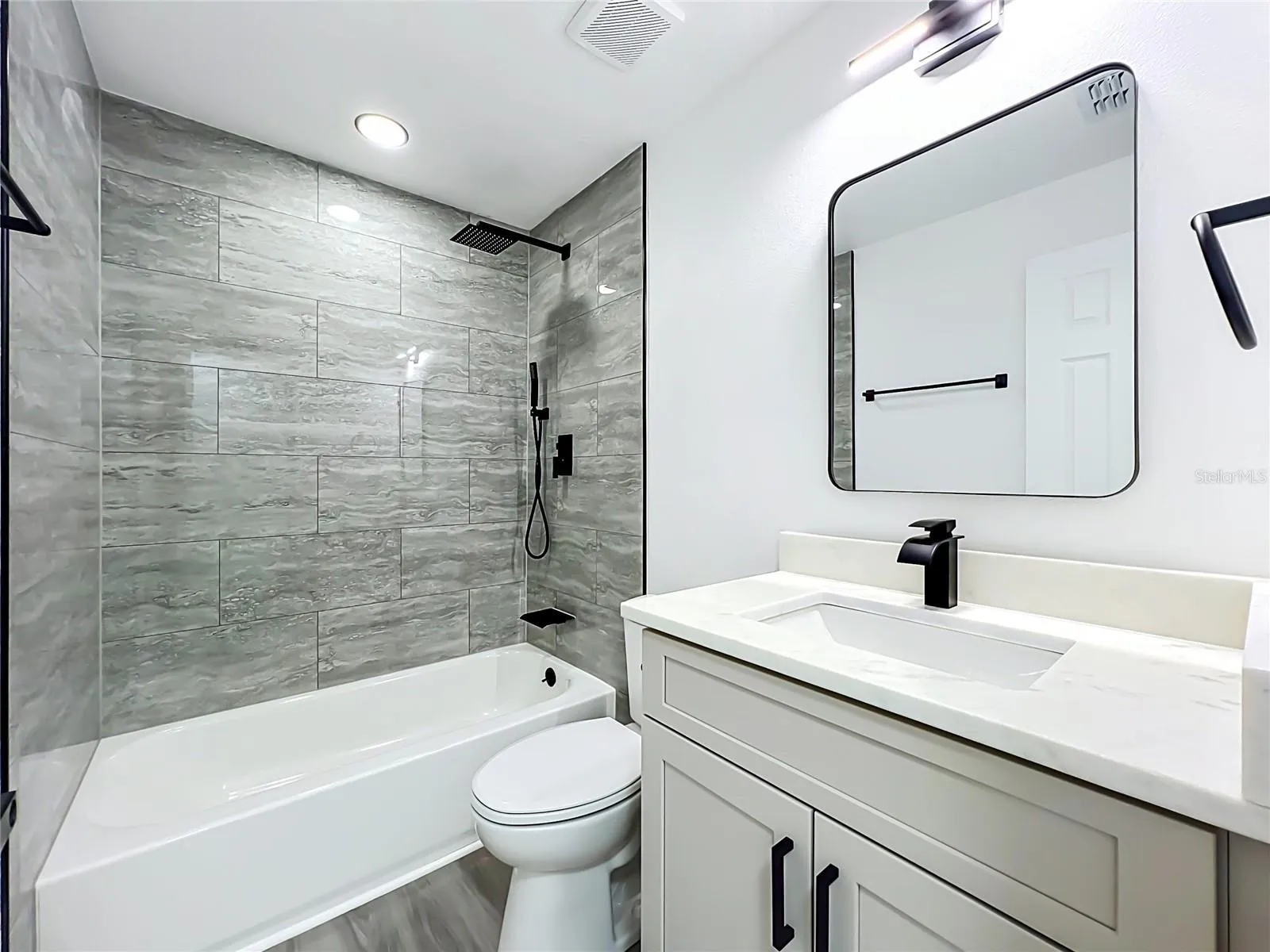 Beautifully updated bathroom with modern finishes