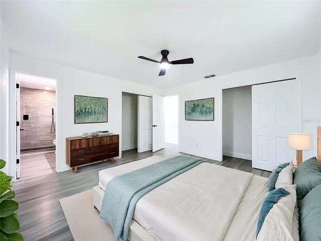 Spacious primary bedroom with modern finishes